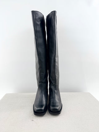 Ganni leather riding boots featuring knee-high distressed leather finish, subtle contrast stitching, and low stacked heel, 40