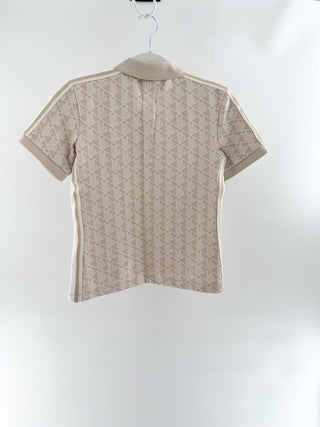 Lacoste polo top featuring Lacoste's allover geometric monogram jacquard pattern, 34