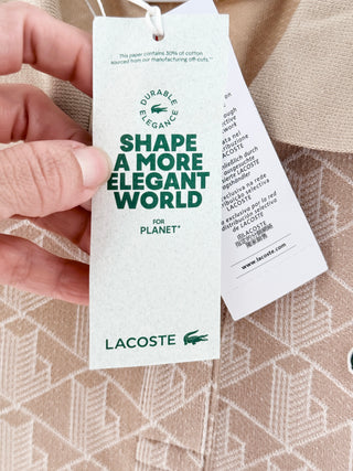 Lacoste polo top featuring Lacoste's allover geometric monogram jacquard pattern, 34
