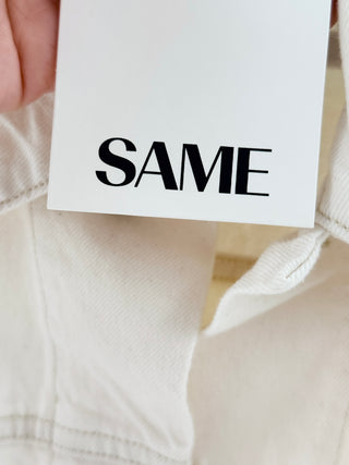 Same the perfect denim jacket crafted from premium rigid denim, features dropped shoulders, button-front closure, and flap chest pockets, XS/S