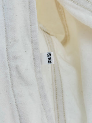 Same the perfect denim jacket crafted from premium rigid denim, features dropped shoulders, button-front closure, and flap chest pockets, XS/S