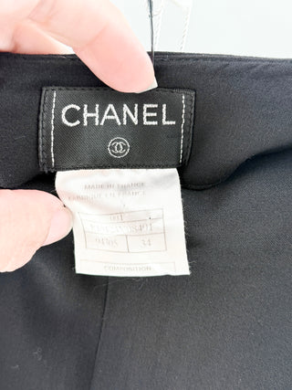 Chanel High waisted straight leg pants with button detail, 34