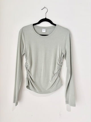 Athleta green long sleeve top, M