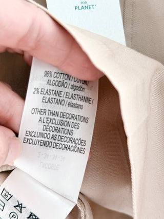 Lacoste chic skirt features structured box pleats that create an A-line silhouette in smooth cotton fabric, 34