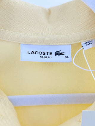Lacoste short-sleeve polo shirt crafted from signature cotton petit knit with tonal embroidered crocodile logo, 34
