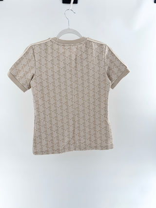 Lacoste slim-fit short sleeve T-shirt featuring an allover geometric monogram jacquard pattern, contrast stripe detailing along shoulder, 32