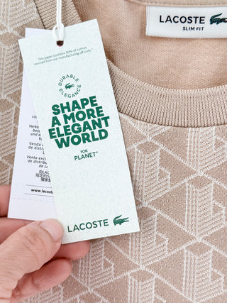 Lacoste slim-fit short sleeve T-shirt featuring an allover geometric monogram jacquard pattern, contrast stripe detailing along shoulder, 32
