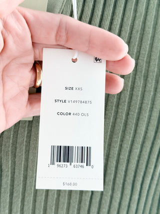 Vince short-sleeve sweater knit from soft ribbed fabric featuring relaxed polo collar and open V-neckline, XXS