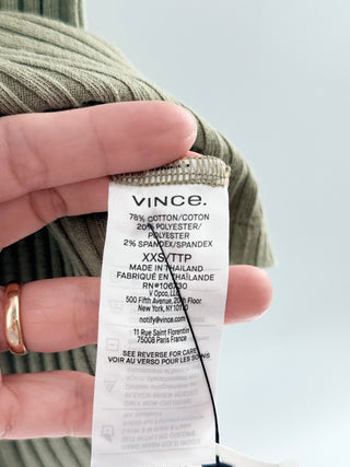 Vince short-sleeve sweater knit from soft ribbed fabric featuring relaxed polo collar and open V-neckline, XXS