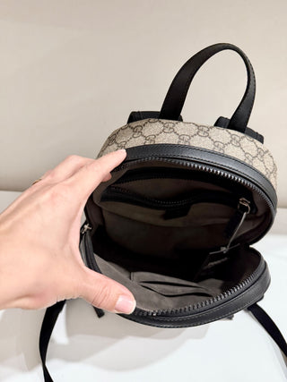 Gucci supreme canvas backpack