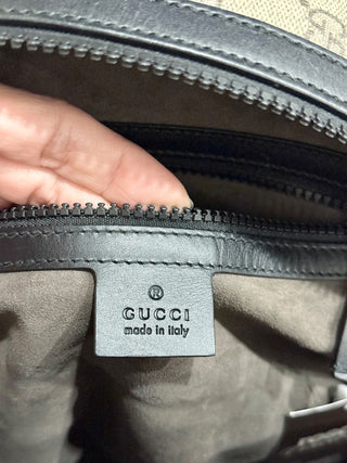 Gucci supreme canvas backpack