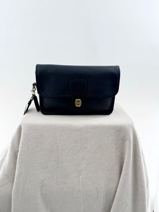Coach leather medium size clutch bag with wristlet