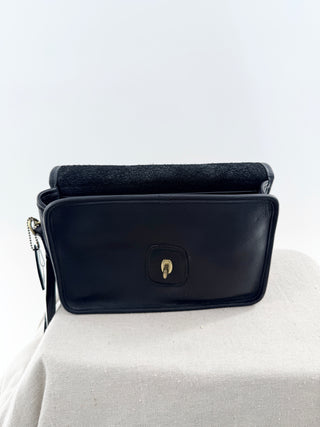 Coach leather medium size clutch bag with wristlet