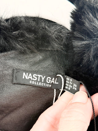 nasty gal "I'm That Girl" faux leather trench coat designed with dramatic oversized faux fur collar and matching cuff detailing, featuring button-front closure and adjustable waist ties, 4