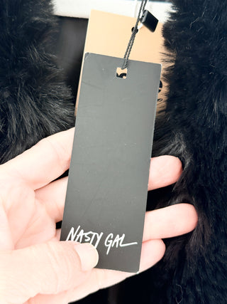 nasty gal "I'm That Girl" faux leather trench coat designed with dramatic oversized faux fur collar and matching cuff detailing, featuring button-front closure and adjustable waist ties, 4