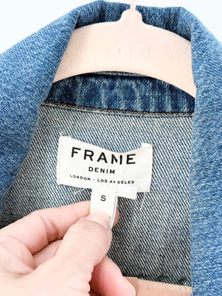 Frame Le studded cotton denim jacket featuring allover stud embellishments designed with front button closure, chest flap pockets, and welt side pockets, S