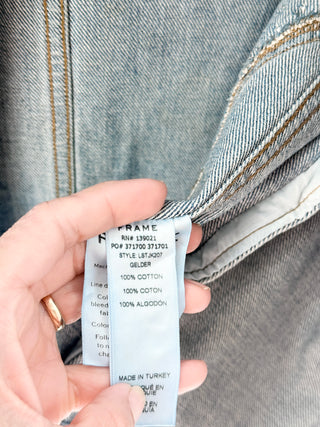 Frame Le studded cotton denim jacket featuring allover stud embellishments designed with front button closure, chest flap pockets, and welt side pockets, S