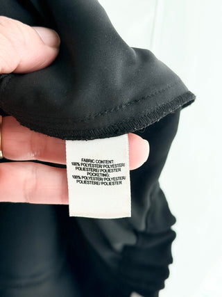 Derek Lam relaxed-fit trousers crafted in soft crepe-knit fabric featuring pull-on waistband and subtle front pleating, 10