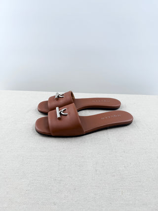 Alexander McQueen leather slides with metal detail, 38