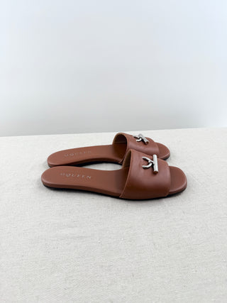 Alexander McQueen leather slides with metal detail, 38