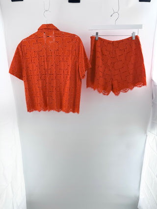 desigual two-piece set featuring intricate floral eyelet embroidery, top is short-sleeve button-front blouse with matching mini shorts, S