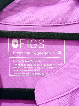 Figs Rafaela Cargo Jogger Scrub Jumpsuit featuring a zip-front closure, cap sleeves, and a drawstring waist, XXS