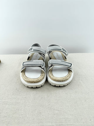 Dior dioract leather sandals featuring padded adjustable straps with gold-tone dior logo hardware, molded ergonomic footbeds, and chunky tread soles, 39