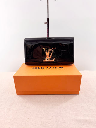 Louis Vuitton patent leather louise clutch bag