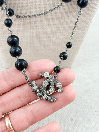 Chanel long vintage necklace with black beads and CC pearls