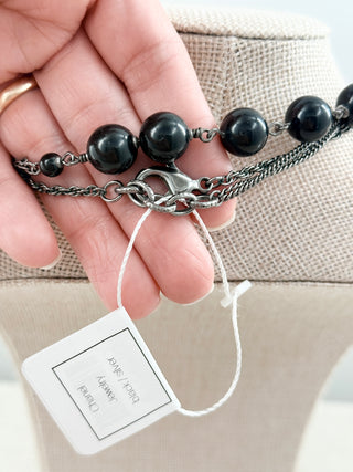 Chanel long vintage necklace with black beads and CC pearls
