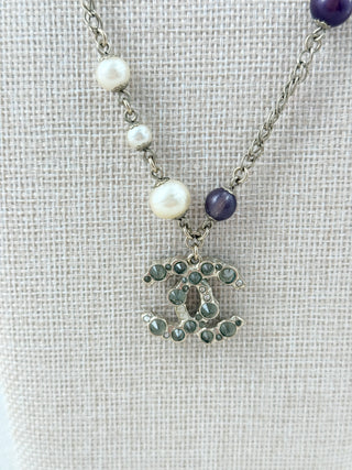 CHANEL vintage necklace with purple stones and CC pendant