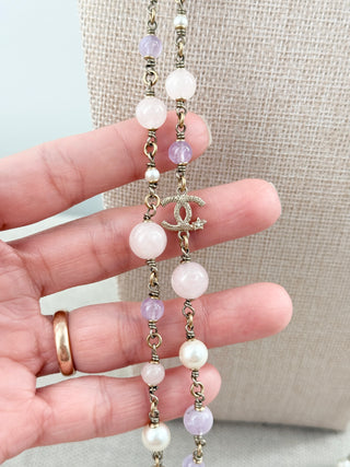 CHANEL vintage long necklace with pink beads and CC