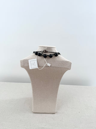 Chanel long vintage necklace with black beads and CC pearls