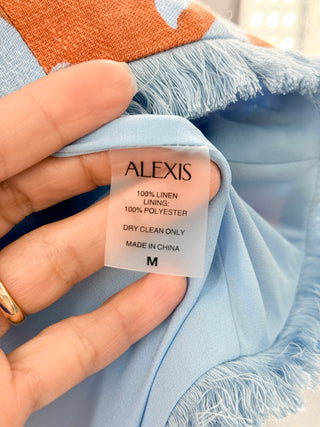 Alexis Two-piece set featuring sleeveless cropped top with clean scoop neckline and matching high-waisted midi skirt, S/M