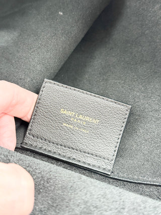 Saint Laurent shopping leather tote bag with YSL charm