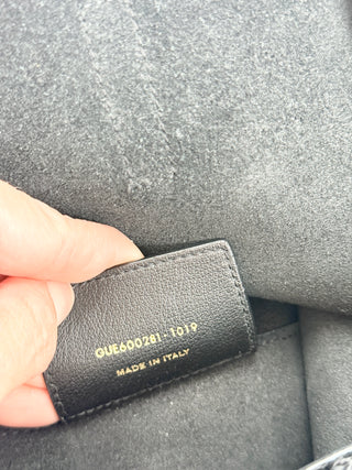 Saint Laurent shopping leather tote bag with YSL charm