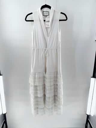 Alexis sleeveless white midi dress with V-neckline, drawstring waist and skirt layered with tiered lace and crochet-style panels, xs