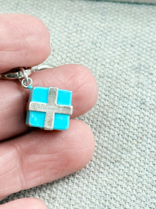 Tiffany & Co. sterling silver charm bracelet blue enamel present and green enamel cupcake charms