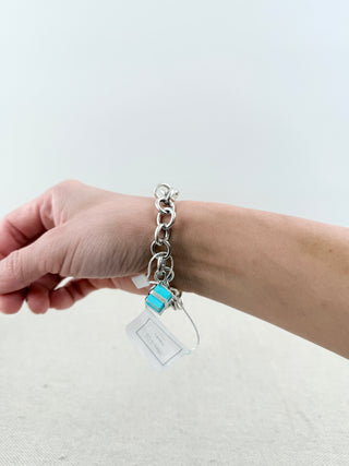 Tiffany & Co. sterling silver charm bracelet blue enamel present and green enamel cupcake charms