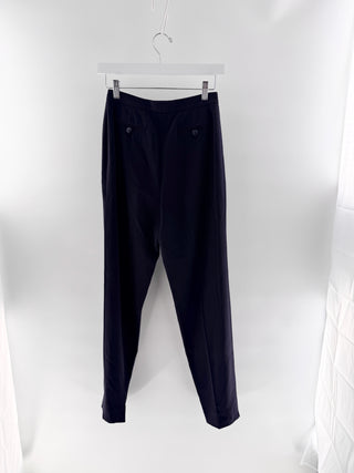 Chanel Wool tailored trousers with pleated front, straight leg fit, & signature CC button, 38