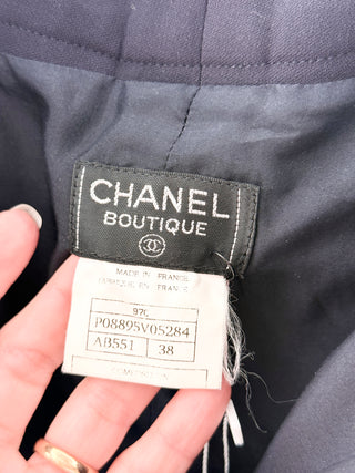 Chanel Wool tailored trousers with pleated front, straight leg fit, & signature CC button, 38