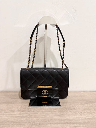 CHANEL lock cross body bag leather