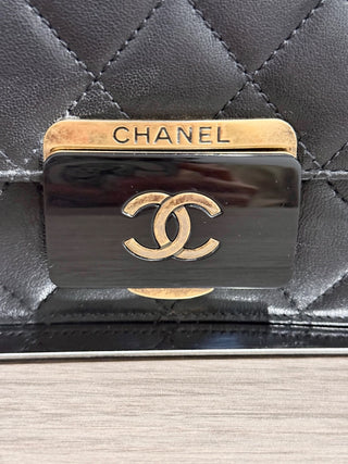 CHANEL lock cross body bag leather