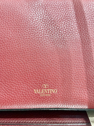 Valentino Garavani Pebbled Calfskin Medium Rockstud Flip Lock Crossbody Bag burgundy