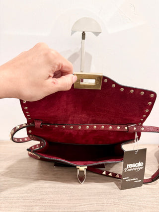 Valentino Garavani Pebbled Calfskin Medium Rockstud Flip Lock Crossbody Bag burgundy