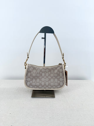 Coach swinger bag in  monogram