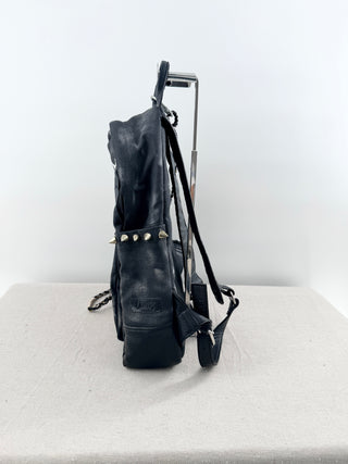 queen b faux leather mini backpack featuring bold tiger graphic on front pocket and stud detailing, designed with top handle, adjustable shoulder straps