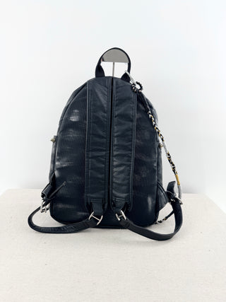 queen b faux leather mini backpack featuring bold tiger graphic on front pocket and stud detailing, designed with top handle, adjustable shoulder straps