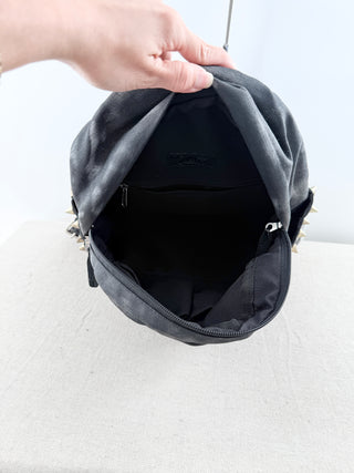 queen b faux leather mini backpack featuring bold tiger graphic on front pocket and stud detailing, designed with top handle, adjustable shoulder straps