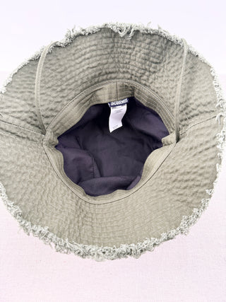 Jacquemus Cotton bucket hat with frayed brim, silver tone logo hardware & adjustable drawstring, 58